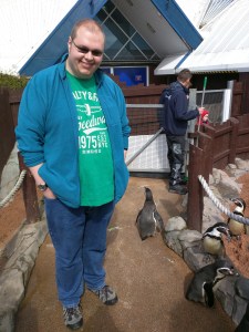 Cameron with the penguins at the Sea Life Centre in Scarborough