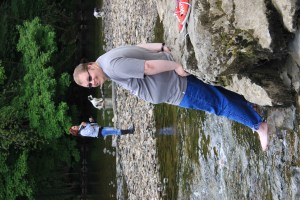 Cameron cooling his feet at Aysgarth Falls